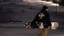 Load image into Gallery viewer, Snowboarder wearing an OG Black Hoodie
